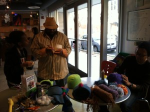 Conference participants helping create puppets. 