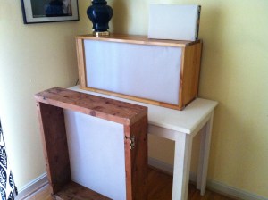 The lightboxes that Genna built. They stack to form a tower. 